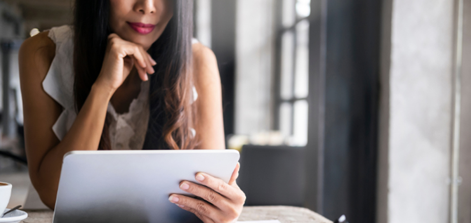 Lady looking at her financial stuff on a tablet